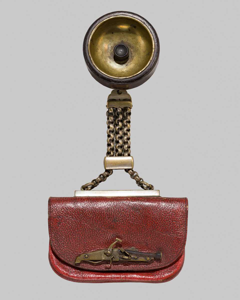 A RARE LEATHER TABAKO-IRE (TOBACCO POUCH) WITH A TANEGASHIMA TEPPO KANAMONO (POUCH CLASP)