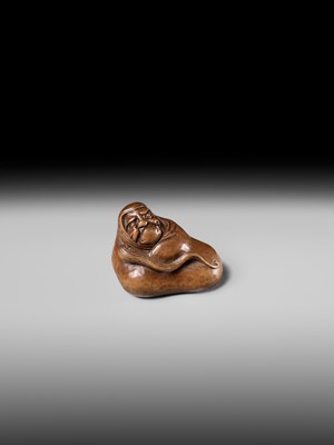 Lot 241 - NOBUSHIGE: A FINE AND RARE WOOD NETSUKE OF DARUMA DISTURBED IN HIS MEDITATION