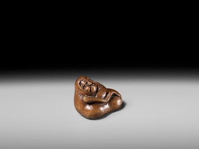 Lot 241 - NOBUSHIGE: A FINE AND RARE WOOD NETSUKE OF DARUMA DISTURBED IN HIS MEDITATION
