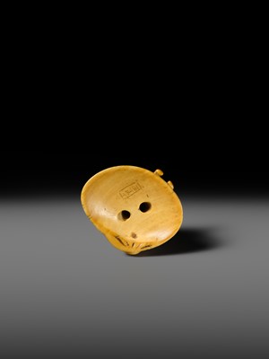 AN IVORY NETSUKE OF A FISHERGIRL (AMA) ON A LARGE CLAM