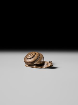 Lot 185 - YUZAN: AN UNUSUAL WOOD NETSUKE OF A SNAIL EMERGING FROM ITS SHELL