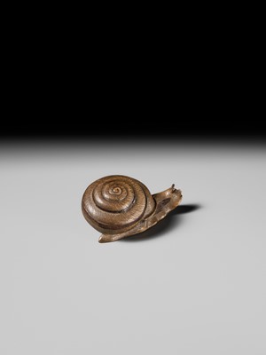 Lot 185 - YUZAN: AN UNUSUAL WOOD NETSUKE OF A SNAIL EMERGING FROM ITS SHELL