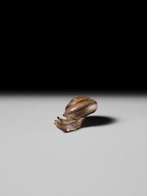Lot 185 - YUZAN: AN UNUSUAL WOOD NETSUKE OF A SNAIL EMERGING FROM ITS SHELL