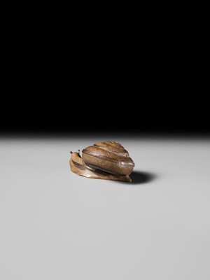 Lot 185 - YUZAN: AN UNUSUAL WOOD NETSUKE OF A SNAIL EMERGING FROM ITS SHELL