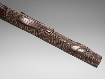 Lot 1448 - A FINE WOOD KISERUZUTSU WITH INSECTS