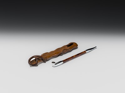 Lot 69 - A FINE WOOD KISERUZUTSU (PIPE CASE) OF A SNAKE ENCIRCLING AN EDAMAME BEAN POD, WITH A MATCHING ‘TORTOISESHELL’ KISERU (PIPE)
