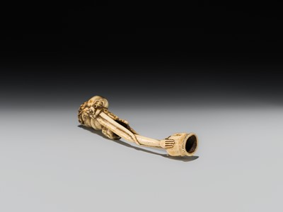 A LARGE AND IMPRESSIVE ANTLER KISERUZUTSU (PIPE CASE) OF TENAGA WITH AN OCTOPUS