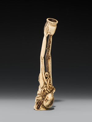 A LARGE AND IMPRESSIVE ANTLER KISERUZUTSU (PIPE CASE) OF TENAGA WITH AN OCTOPUS