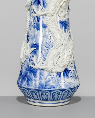 Lot 193 - A LARGE BLUE AND WHITE HIRADO PORCELAIN ‘DRAGON’ VASE