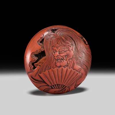 Lot 351 - JUGYOKU: A RARE TSUISHU (CARVED RED LACQUER) MANJU NETSUKE OF A NOH ACTOR