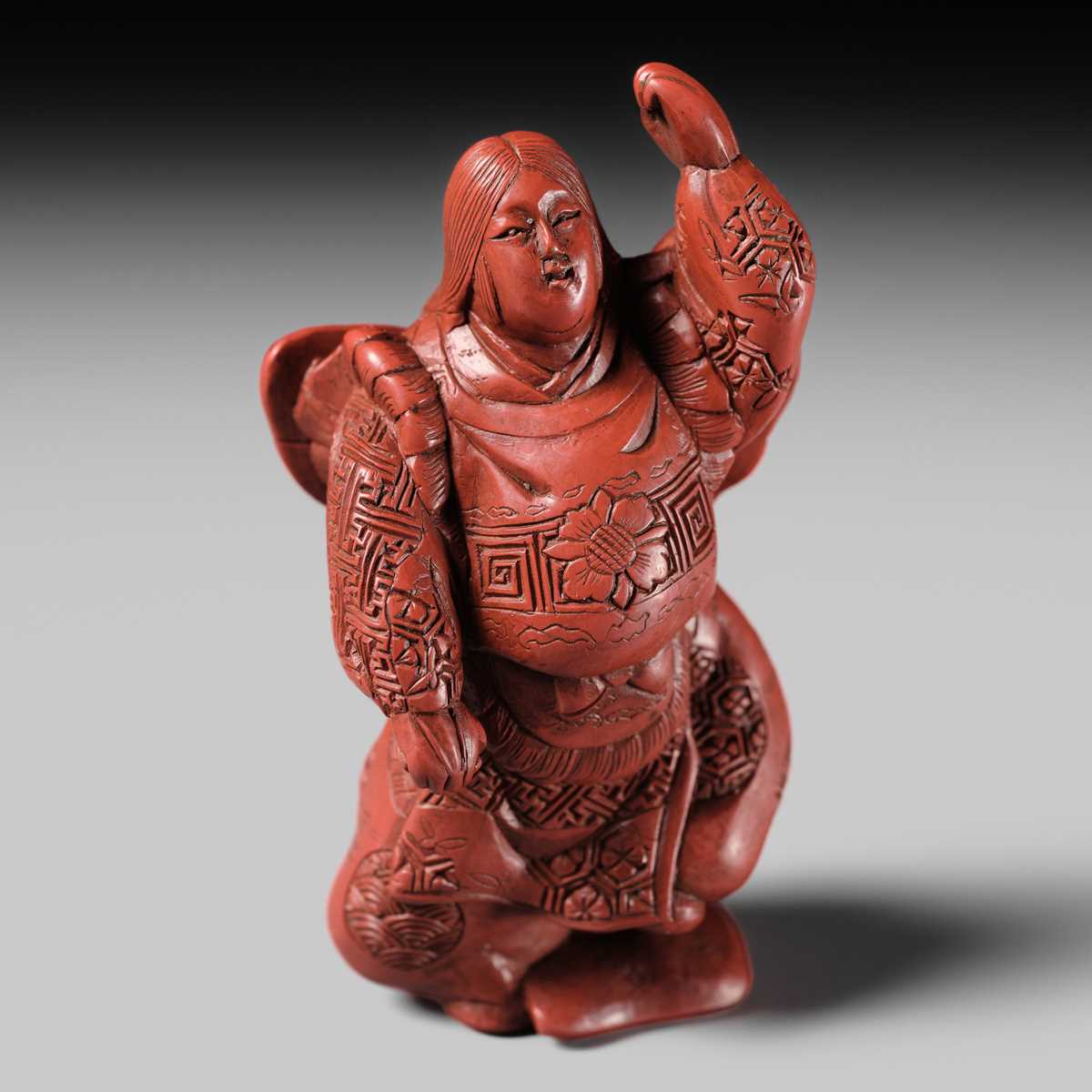 Lot 368 - MATSUKI HOKEI: A SUPERB TSUISHU LACQUER NETSUKE OF A BUTTERFLY DANCER, KOCHO NO MAI