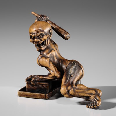 Lot 419 - ROKKO: A SUPERB SMALL WOOD OKIMONO OF AN EMACIATED RAT CATCHER