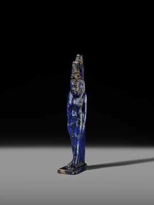 Lot 59 - A RARE LAPIS LAZULI FIGURE OF ISIS, LATE PERIOD, 664-332 BC