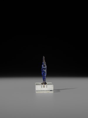 Lot 59 - A RARE LAPIS LAZULI FIGURE OF ISIS, LATE PERIOD, 664-332 BC
