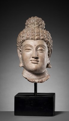 Lot 684 - A RARE AND IMPORTANT TERRACOTTA HEAD OF BUDDHA SHAKYAMUNI