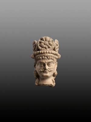 Lot 683 - A TERRACOTTA HEAD OF A BODHISATTVA, 3RD-5TH CENTURY