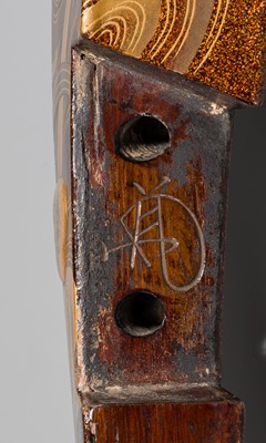 Lot 512 - A SUPERB LACQUERED WOOD KURA (SADDLE) WITH IRISES IN WATER