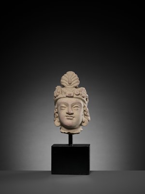 Lot 682 - A TERRACOTTA HEAD OF MAITREYA