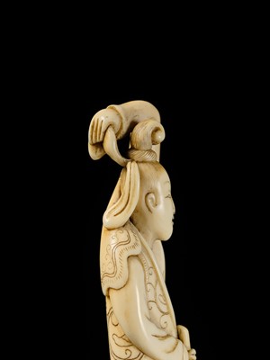 Lot 108 - A REMARKABLE TALL IVORY NETSUKE OF A YOUTHFUL CHINESE FIGURE