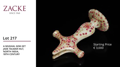 Lot 217 - A MUGHAL GEM-SET JADE TALWAR HILT, NORTH INDIA, 18TH CENTURY