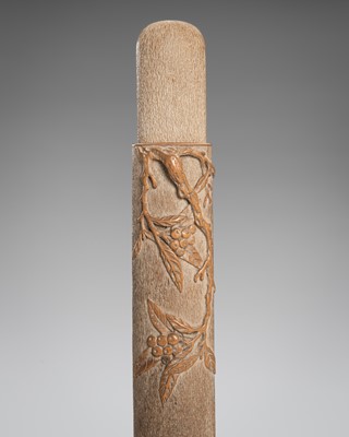 Lot 1469 - A SMALL WOOD KISERUZUTSU WITH A FRUITY BRANCH