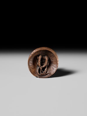 Lot 188 - ICHIMIN: A FINE NAGOYA SCHOOL WOOD NETSUKE OF A TOAD ON A KASA HAT