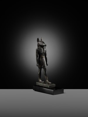 Lot 4 - A FINE AND RARE GILT-BRONZE FIGURE OF ANUBIS, LATE PERIOD
