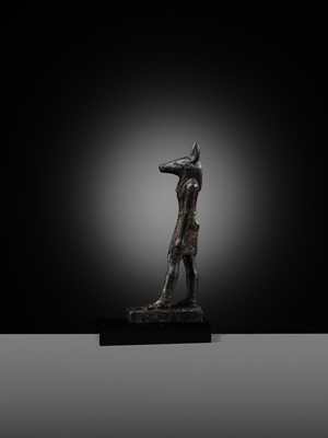 Lot 4 - A FINE AND RARE GILT-BRONZE FIGURE OF ANUBIS, LATE PERIOD