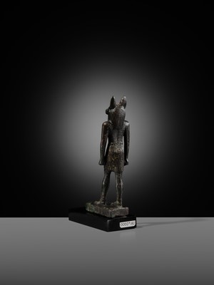 Lot 4 - A FINE AND RARE GILT-BRONZE FIGURE OF ANUBIS, LATE PERIOD