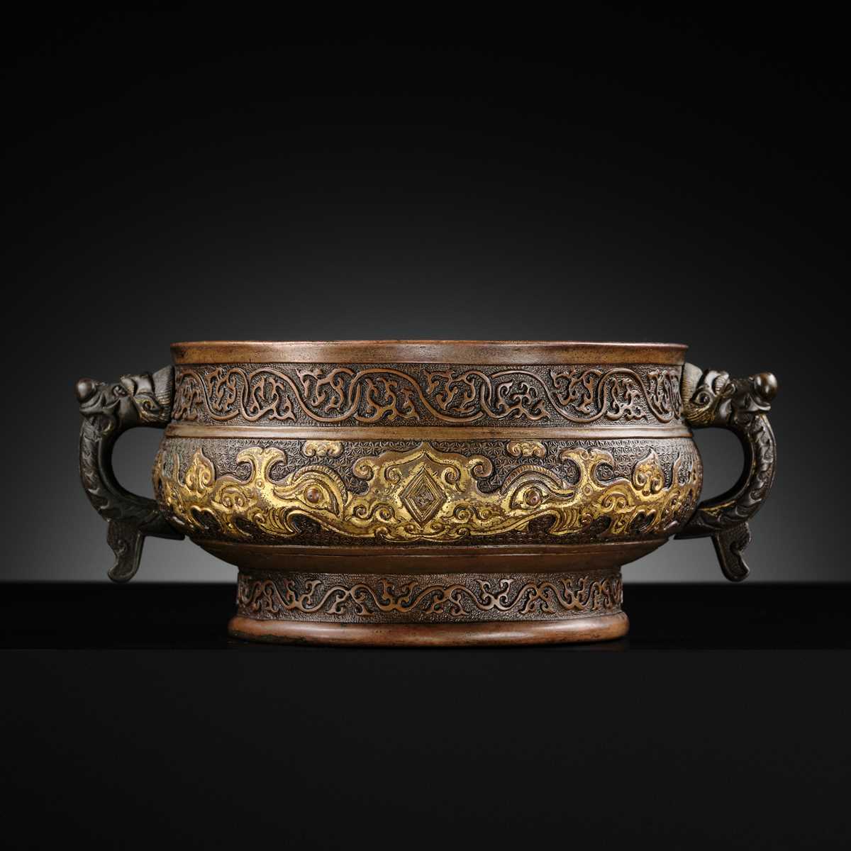 Lot 79 A HU WENMING PARCEL GILT BRONZE CENSER MING lot-79-a-hu-wenming-parcel-gilt-bronze-censer-ming