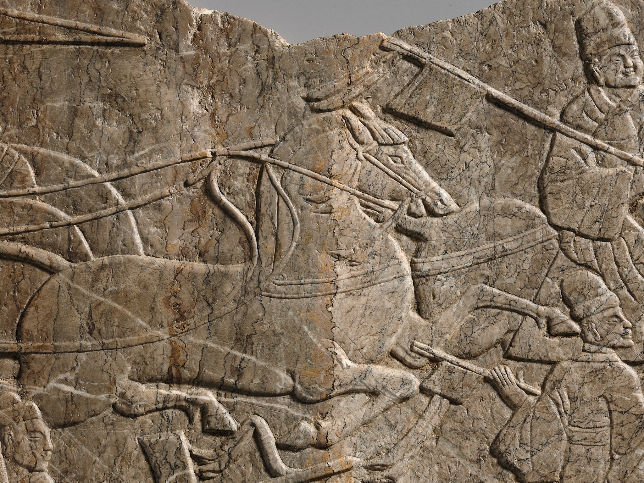 Lot 49 - AN EXCEPTIONALLY RARE LIMESTONE RELIEF OF