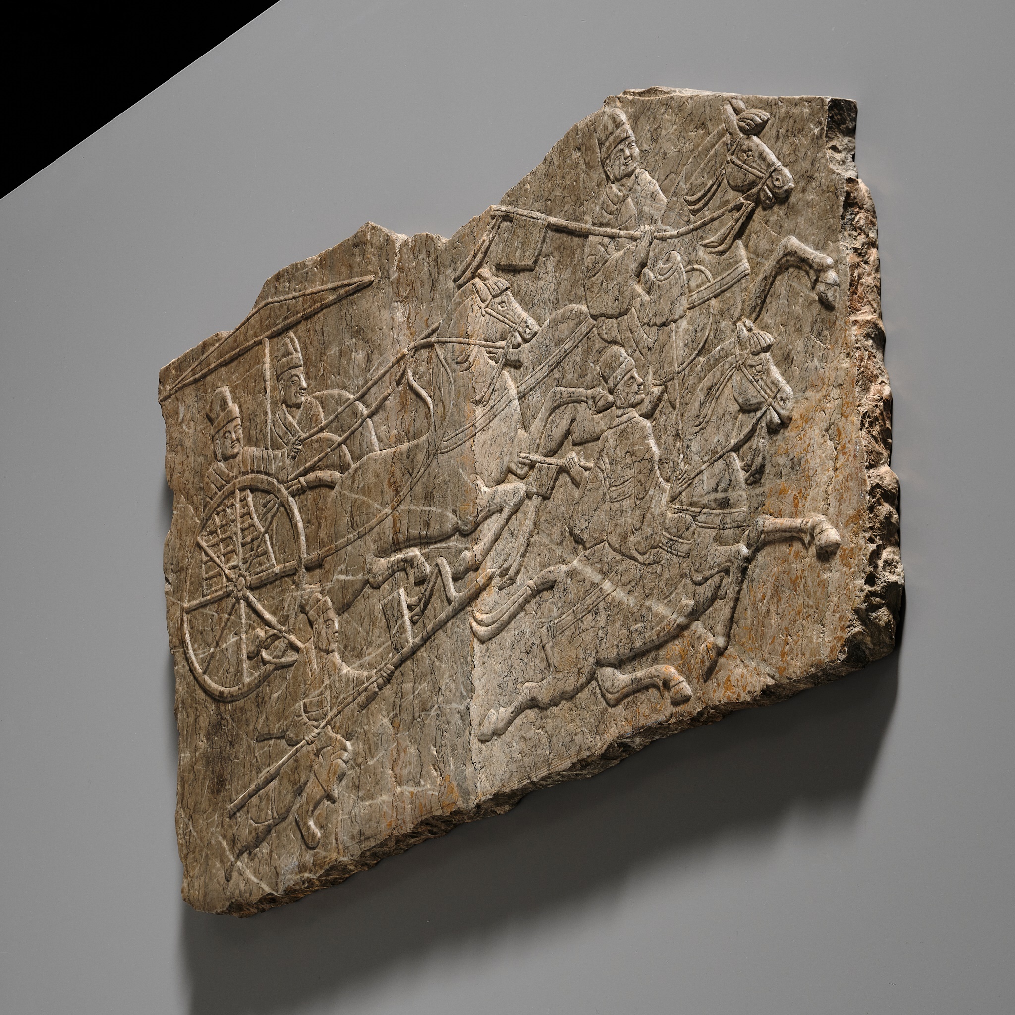 Lot 49 - AN EXCEPTIONALLY RARE LIMESTONE RELIEF OF