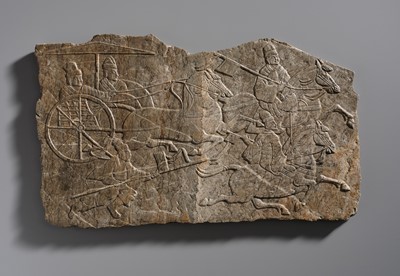 Lot 49 - AN EXCEPTIONALLY RARE LIMESTONE RELIEF OF RIDERS AND CHARIOTEERS, EASTERN HAN TO SIX DYNASTIES