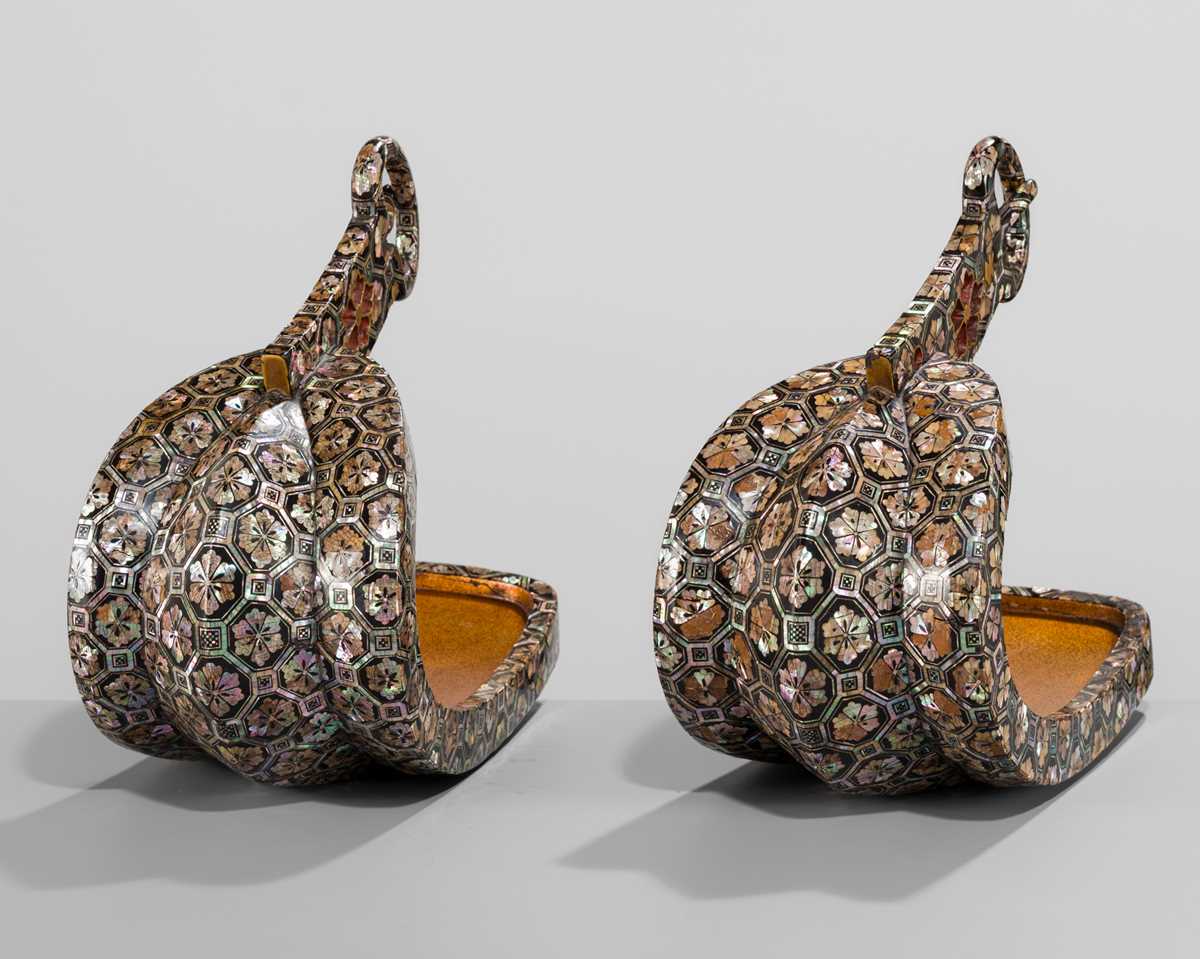 Lot 133 - A FINE PAIR OF MOTHER-OF-PEARL-INLAID LACQUERED IRON STIRRUPS (ABUMI)