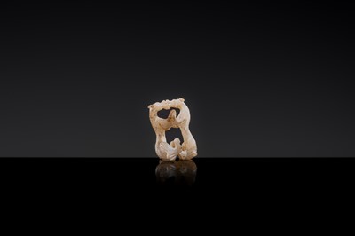 Lot 19 - A RETICULATED WHITE JADE MINIATURE PENDANT OF TWO FROLICKING TIGERS, WARRING STATES OR WESTERN HAN DYNASTY