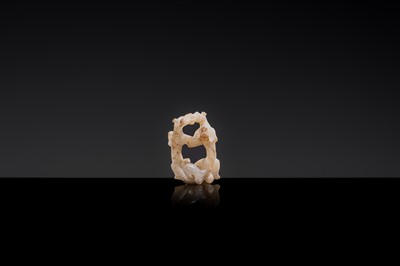 Lot 19 - A RETICULATED WHITE JADE MINIATURE PENDANT OF TWO FROLICKING TIGERS, WARRING STATES OR WESTERN HAN DYNASTY