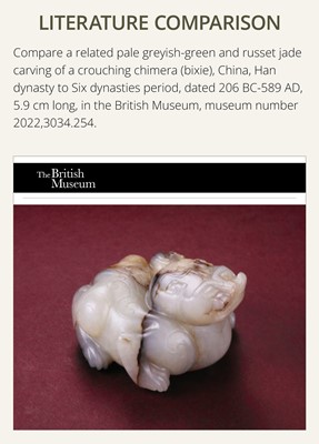 Lot 20 - A MOTTLED WHITE JADE CARVING OF A BIXIE, SIX DYNASTIES PERIOD