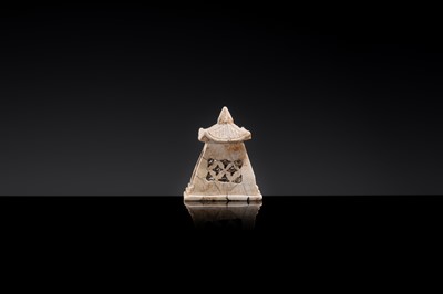 Lot 21 - A MINIATURE ‘CHICKEN BONE’ JADE PAGODA, TANG DYNASTY