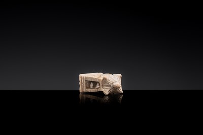 Lot 21 - A MINIATURE ‘CHICKEN BONE’ JADE PAGODA, TANG DYNASTY