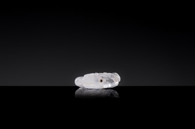 Lot 26 - A FINE ROCK CRYSTAL ‘RECLINING CAMEL’ PENDANT, LIAO DYNASTY