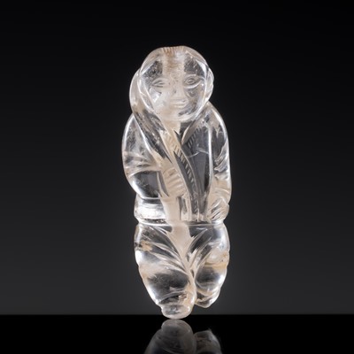 Lot 25 - A CHARMING ROCK CRYSTAL ‘BOY WITH LOTUS’ PENDANT, LIAO DYNASTY