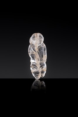 Lot 25 - A CHARMING ROCK CRYSTAL ‘BOY WITH LOTUS’ PENDANT, LIAO DYNASTY