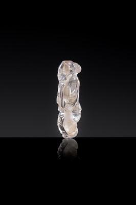 Lot 25 - A CHARMING ROCK CRYSTAL ‘BOY WITH LOTUS’ PENDANT, LIAO DYNASTY
