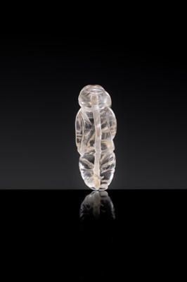 Lot 25 - A CHARMING ROCK CRYSTAL ‘BOY WITH LOTUS’ PENDANT, LIAO DYNASTY