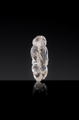 Lot 25 - A CHARMING ROCK CRYSTAL ‘BOY WITH LOTUS’ PENDANT, LIAO DYNASTY