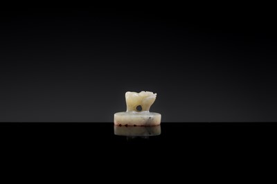 Lot 22 - A PALE CELADON JADE ‘OX’ SEAL, YUAN DYNASTY