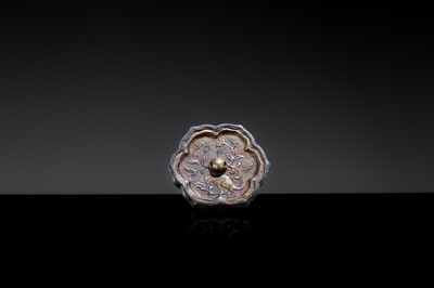 A GILT METAL-SHEET INLAID SILVER ‘SLEEVE’ MIRROR WITH A SQUIRREL, TANG DYNASTY