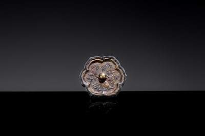 A GILT METAL-SHEET INLAID SILVER ‘SLEEVE’ MIRROR WITH A SQUIRREL, TANG DYNASTY