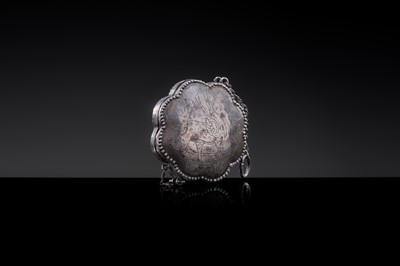 Lot 13 - A MINIATURE PARCEL-GILT SILVER ‘WINGED DEER’ BOX AND COVER, TANG DYNASTY