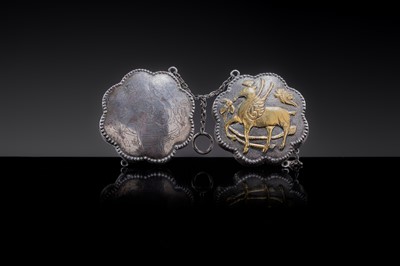 Lot 13 - A MINIATURE PARCEL-GILT SILVER ‘WINGED DEER’ BOX AND COVER, TANG DYNASTY
